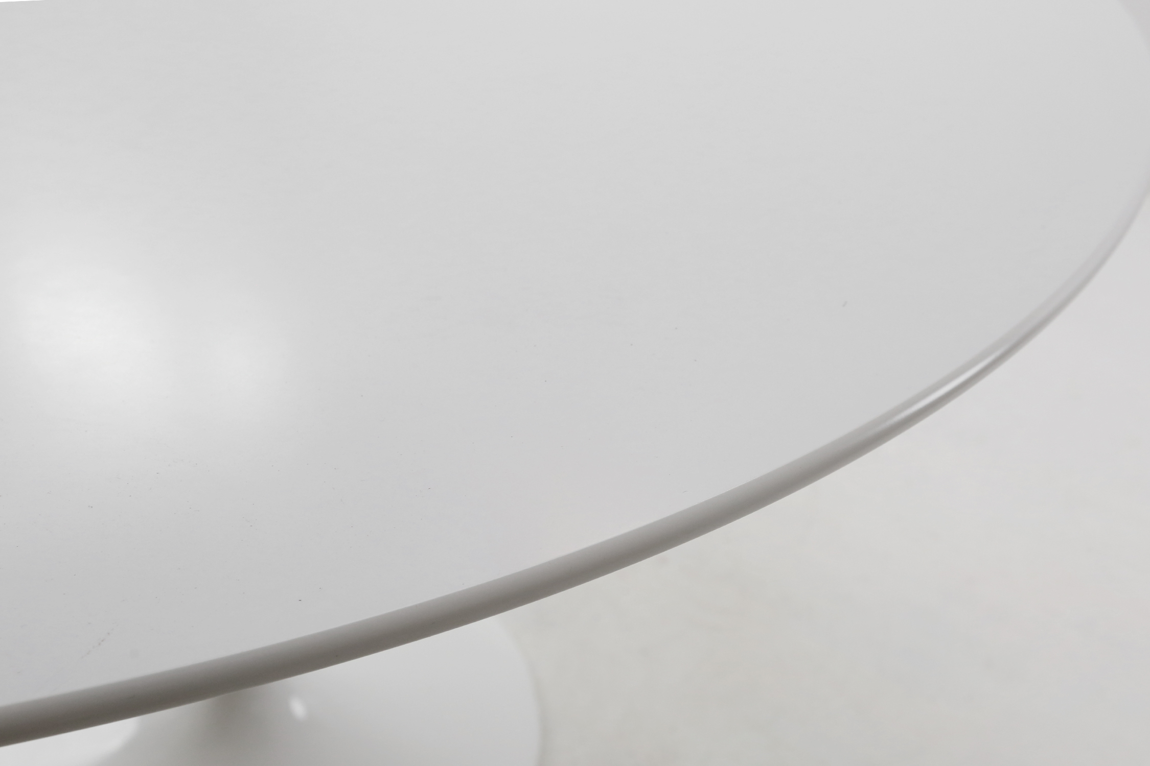 Dining table by Eero Saarinen for Knoll
